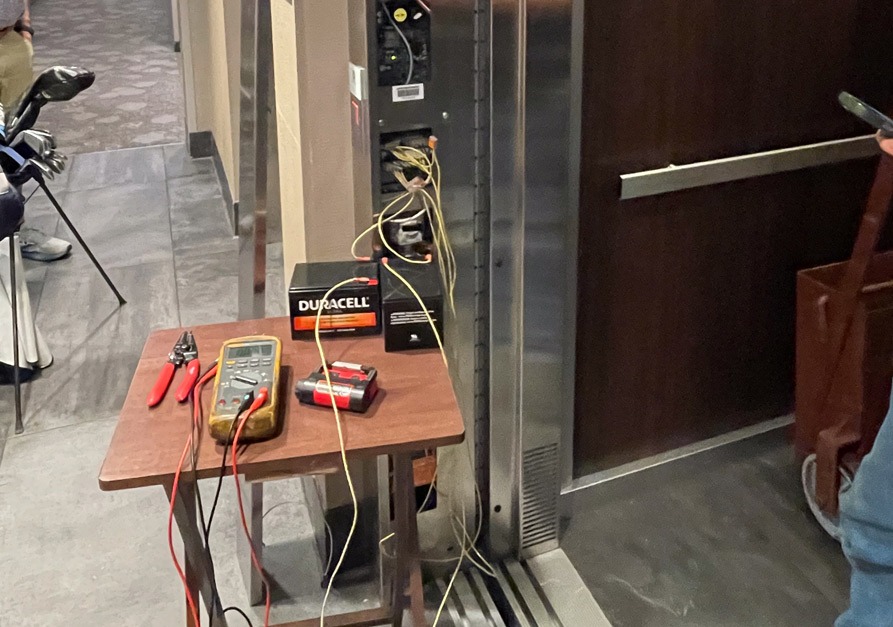 Wires being repaired in an elevator